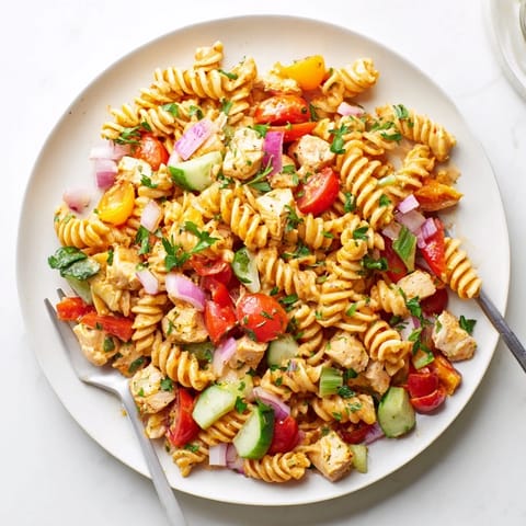 Tender diced chicken and spiral pasta are tossed with crisp veggies in a vibrant honey mustard dressing.